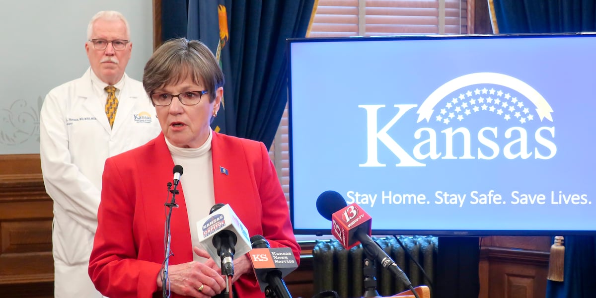 Kansas governor signs order ma...